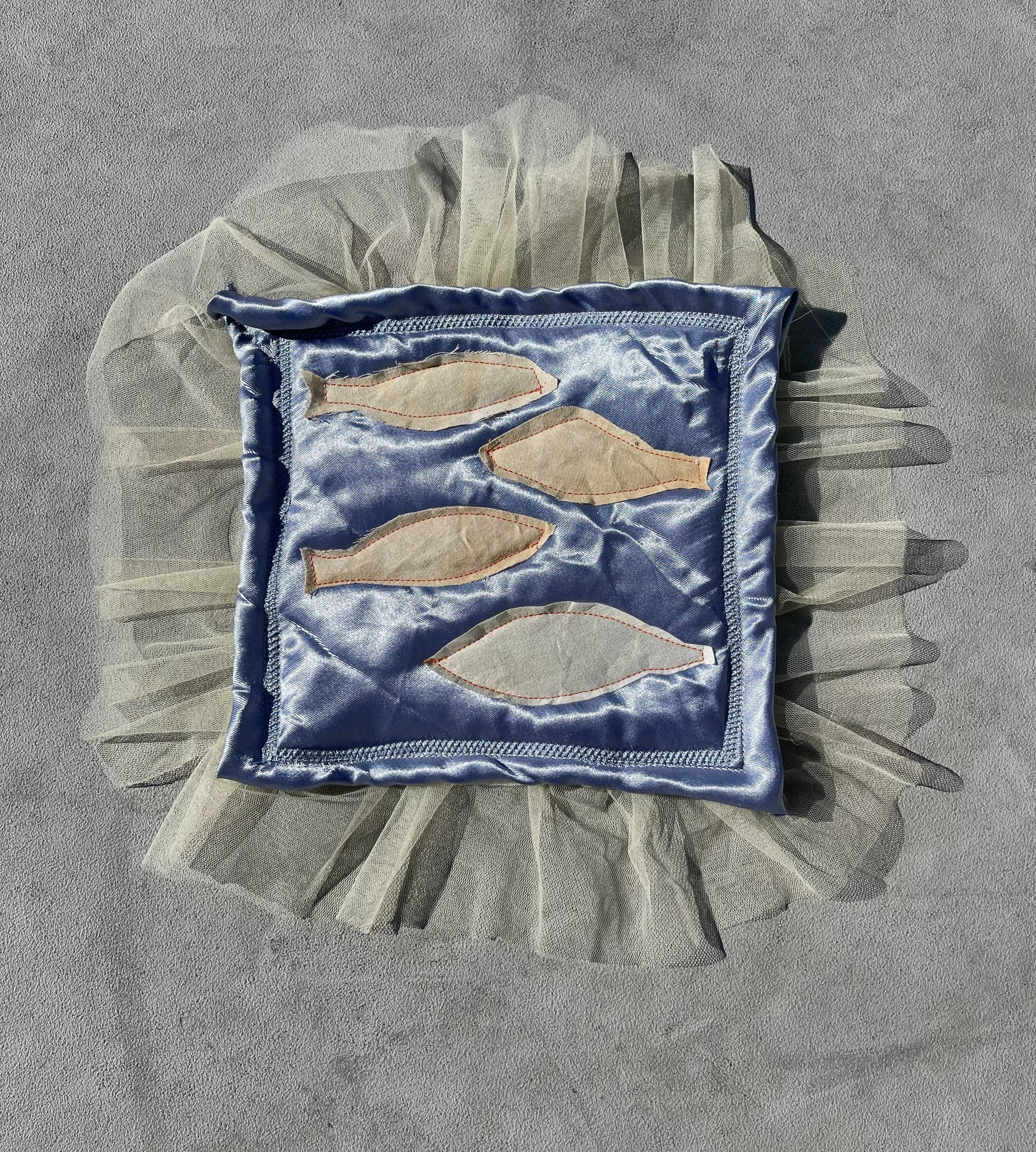 Aquarium, 2023.
This work is an exploration of different shapes and materials, using found objects and hand dyed satin. 