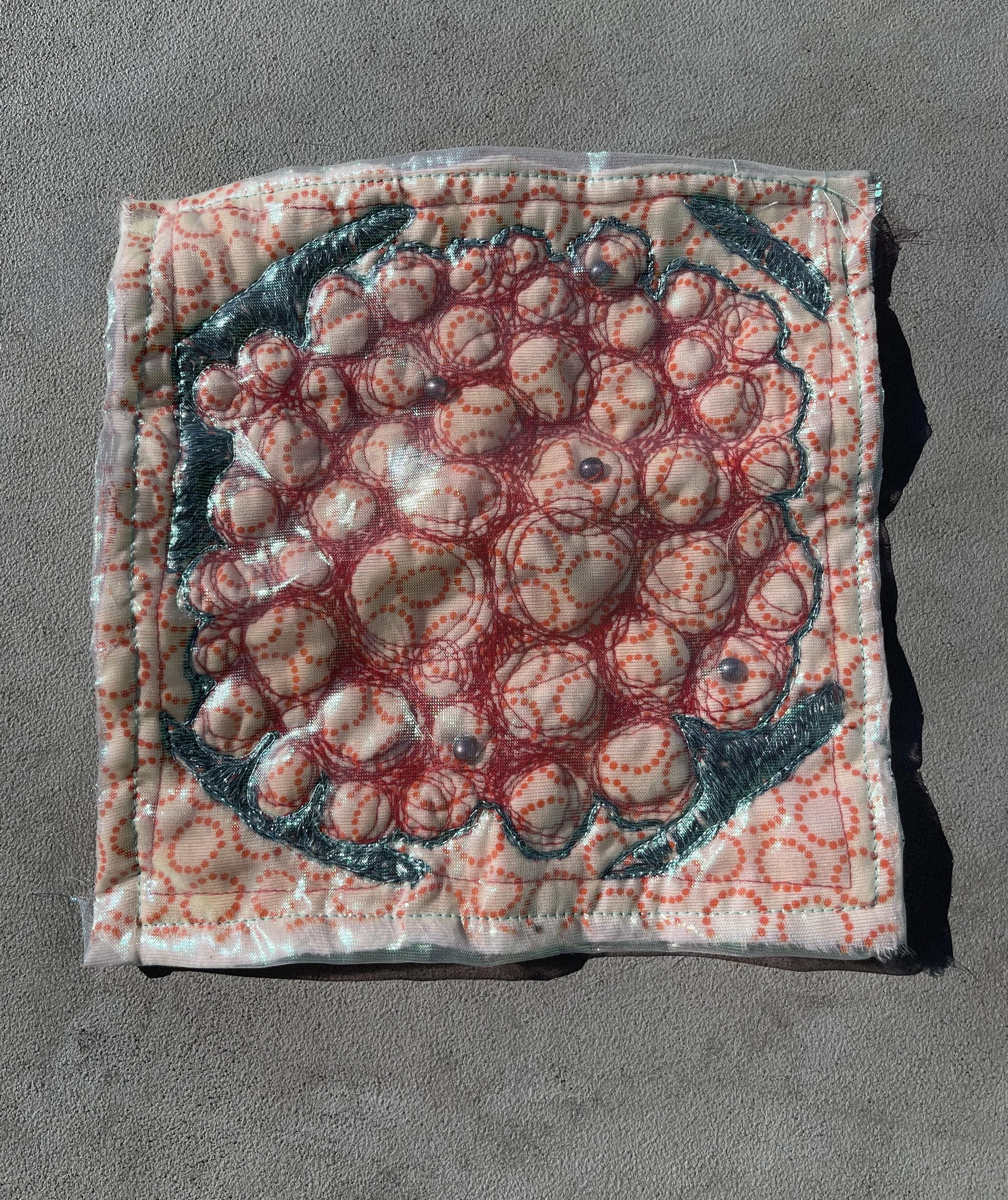 Caviar, 2023.
An exploration of shape and texture. Made from secondhand materials, this piece mimics the form of fish eggs. 