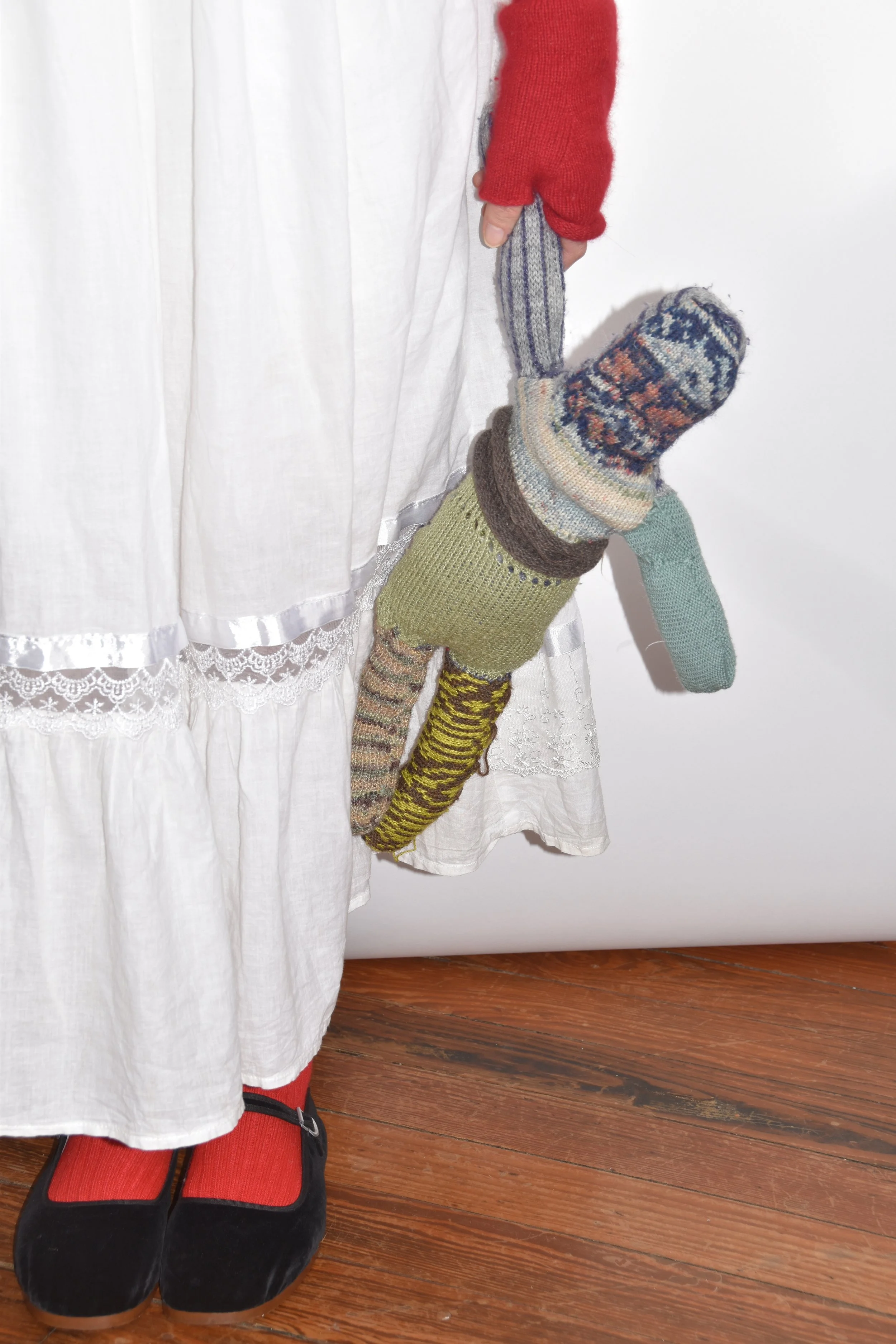 Rag Idol, 2023.
Made using knit samples that would have otherwise been thrown out, this doll has a face that is based on a handmade punchcard of the Shroud of Turin. Having grown up without a particular stuffed toy, I played with the Idea of how one